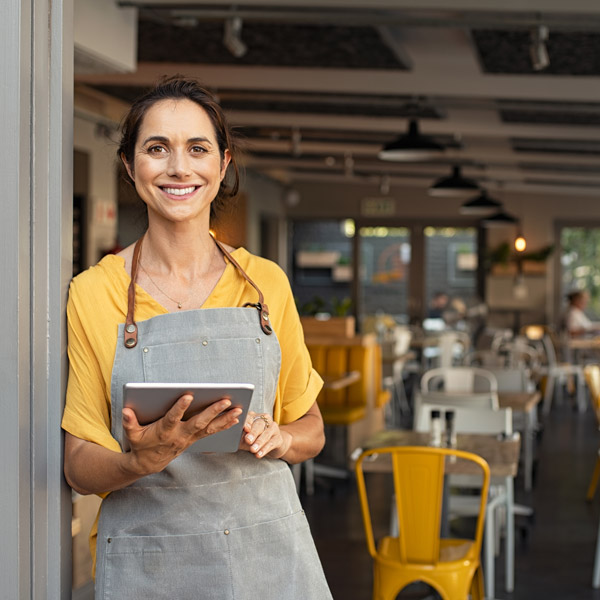 business owner holding tablet