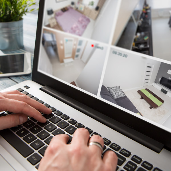 viewing home security on laptop