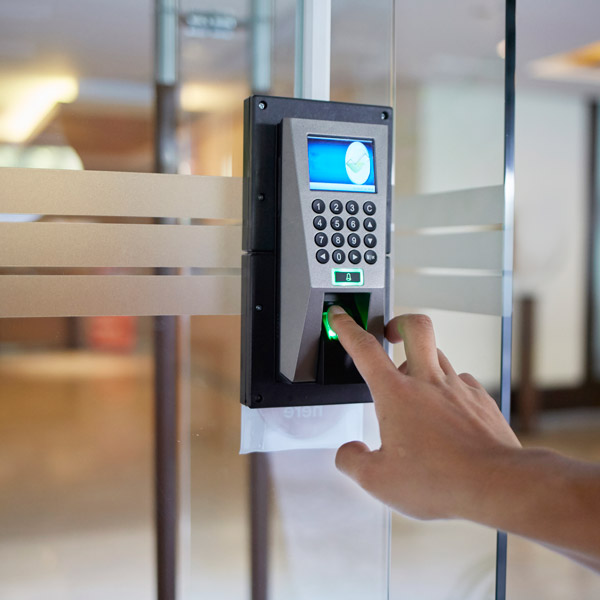 man using fingerprint to enter building